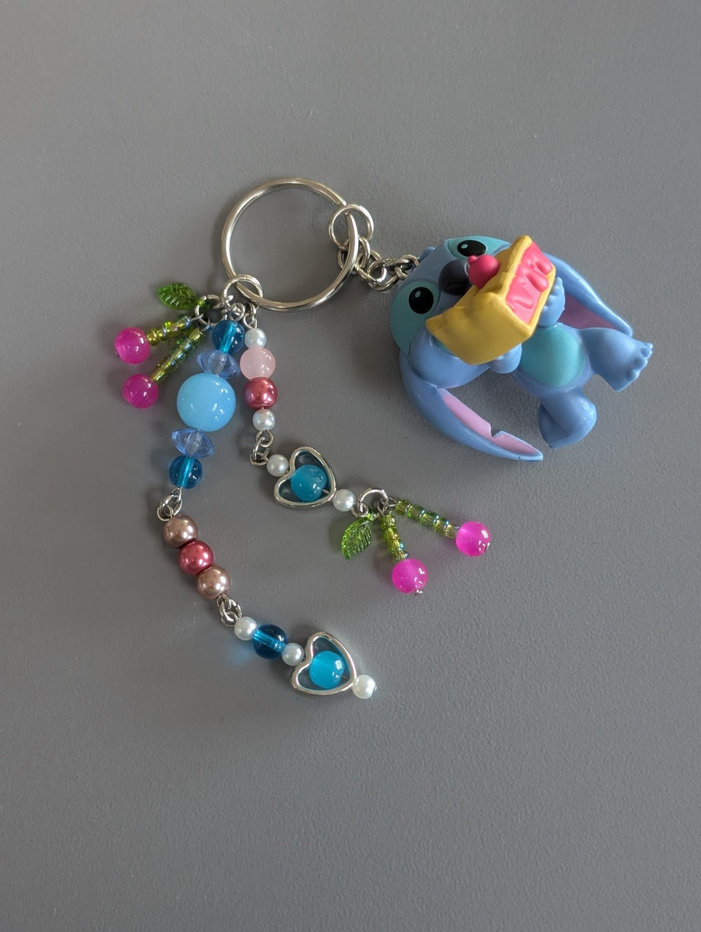 Stitch Eating a Cherry Pie Bag Charm