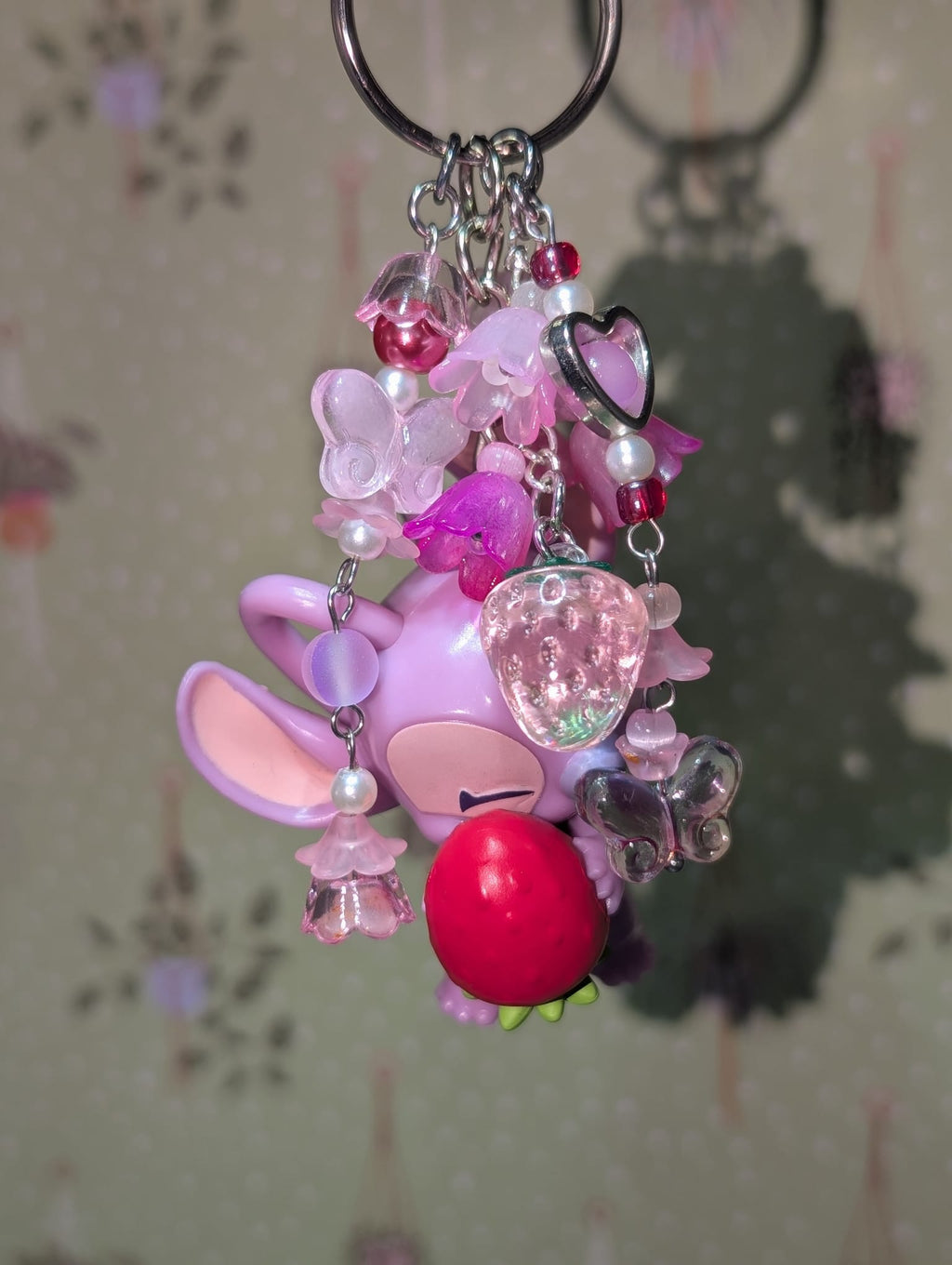 Angel Holding a Strawberry Bag Charm