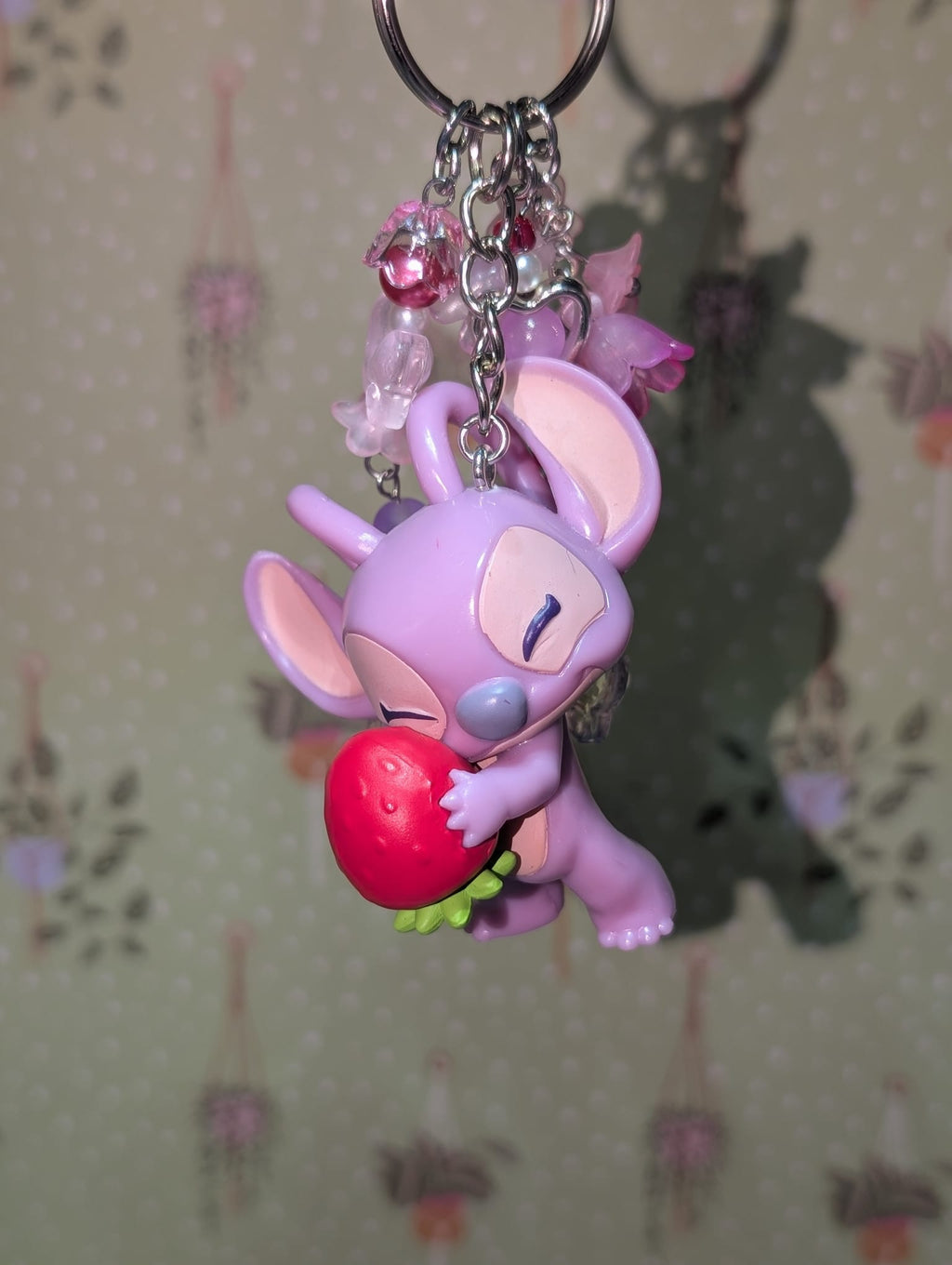 Angel Holding a Strawberry Bag Charm