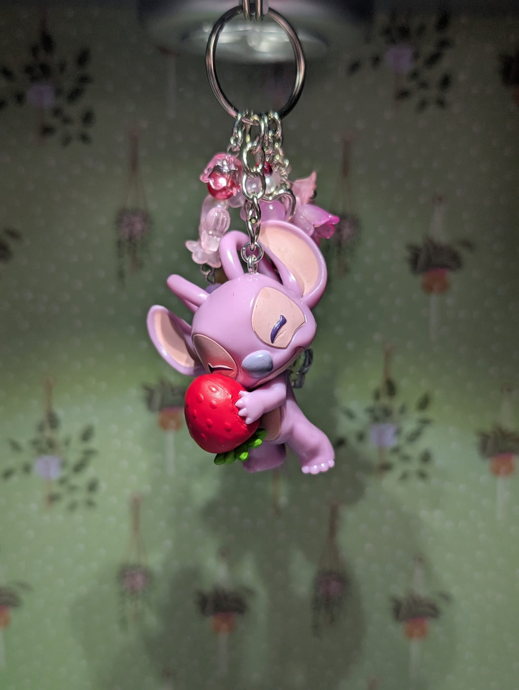 Angel Holding a Strawberry Bag Charm